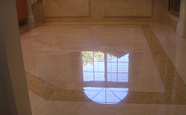 Crema Marfil and limestone shower, after stone restoration